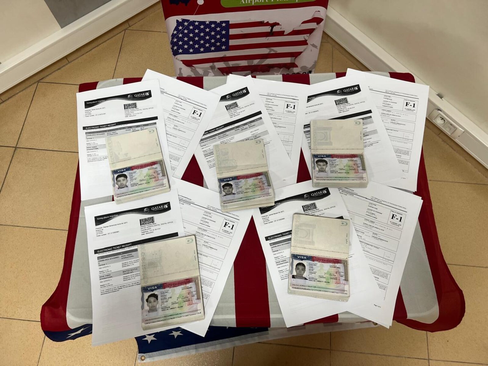 Approved F-1 visas and flight tickets